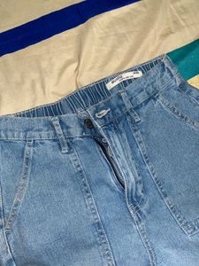 light blue colour shirt with a laces in back side