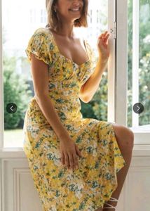 A-Line FloralPrinted Calf Length Yellow dress.