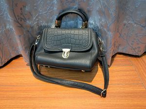 34) Black Croc-Embossed Satchel