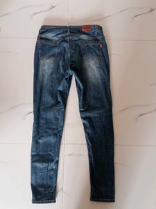 Distressed Denim Jeans