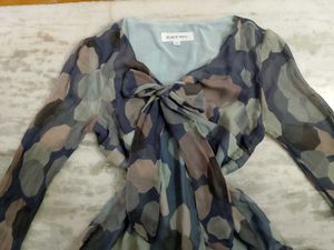 Stylish Top with Tie Detail.