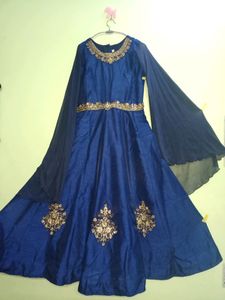 Festive Gown With Extended Cape Sleeves