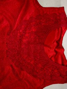 Red Sleeveless top.