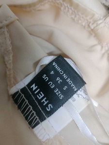 Satin top with rhinestone