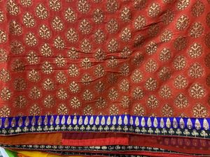 YELLOW ORANGE SHIFFON AND HEAVY EMBROIDERY SAREE