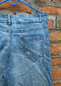 Light blue wide-leg jeans.