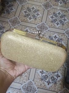 Elegant Gold Glitter Clutch