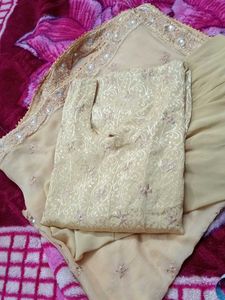 Elegant golden colour Indian suit