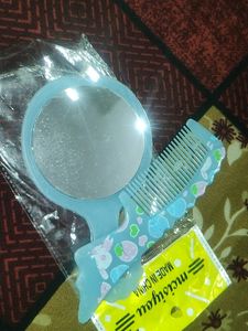 Small Mirror And Comb