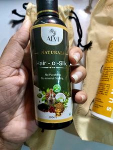 Sunscreen and Hair-O-Silk hair oil