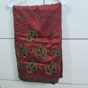 Maroon Silk Saree With Green And Golden Embroidery And Glitter Paint Work