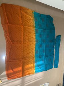 Lovely green and yellow bandheej Saree
