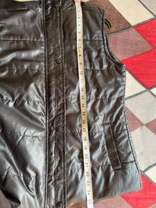 Almost brand new sleeveless black jacket