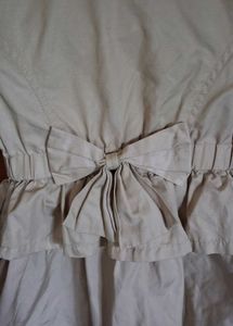 Ruffled Beige Trench Coat