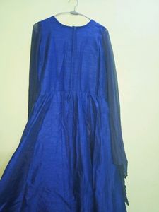 Festive Gown With Extended Cape Sleeves
