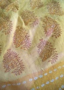 yellow printed saree attached fall