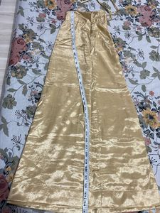 Petticoat Or Underskirt Of Saree In Gold Colour