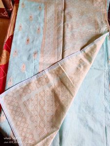 Elegant Aqua Saree with Intricate Paisley Detail