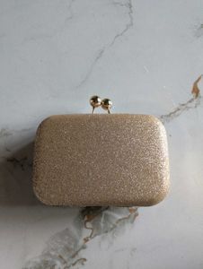 Smart Gold Clutch