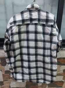 A Black &amp; White Checkered Shirt