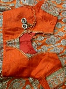 Orange Embroidered Lehenga style saree