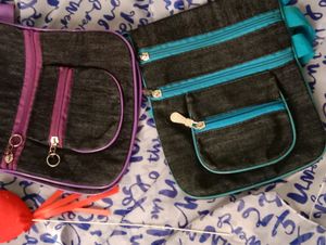 Sling Bags Of Combo Colours, 🟣 And 🔵 With 4 Big Compartments With 1 Small Compartment Also With Adjustable Straps Zips At Good Condition Material Is Soft And Flexible
