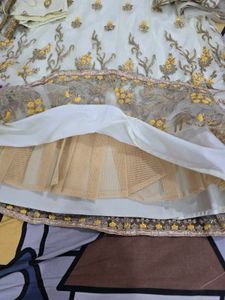 net lehanga with embroidery