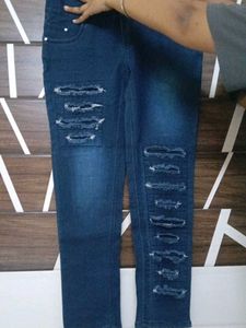 Ripped Dark Blue Jeans