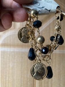 Gold Tone Coin and Bead Charm Bracelet