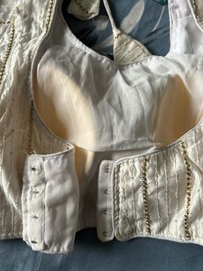 White with golden stripes detailing
