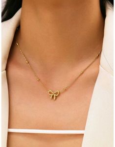 Gold Bow Pendant Necklace
