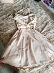 Light Pink Coloured One Piece With Bow Design At Back