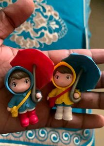 Cute cartoon little girl holding an umbrella
