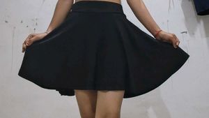 a black skirt with attached shorts inside