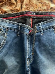 Distressed Blue Jeans