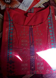 Vibrant Pink Kurti with Ethnic Motifs By W