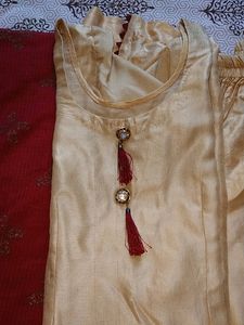 Silk Suit With Maroon Dupatta With Golden Lace