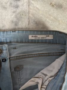 Distressed Denim Jeans