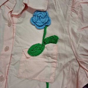 Stylish Pink Button-Up Shirt with Floral Applique