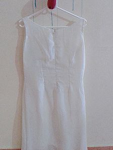 Plain White Half Frock With Sequenced Portion Till Bust.