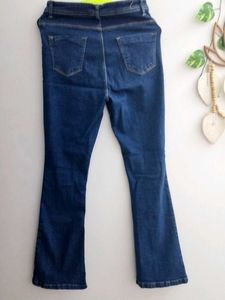 Perfectly new pair of blue bootcut denim jeans.