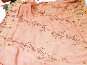 Rust colour saree with tie and die beautiful embroidery...pure georgette  saree