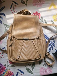 Tan Quilted Backpack