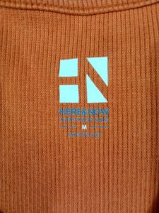 A Orange Color Top. Size - M