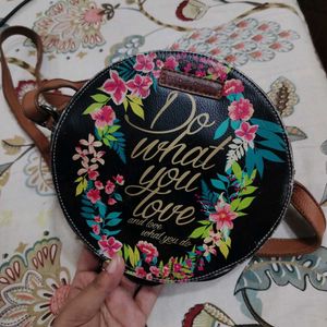 ROUND SLING BAG