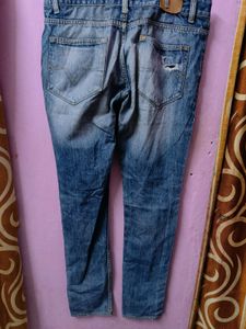 Ripped Blue Denim Jeans