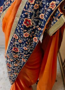 Elegant Orange Embroidered Saree 💕