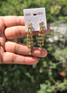 2 Pairs Of AD Earrings