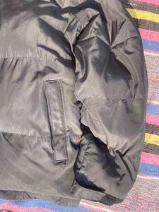 black oversized puffer jacket