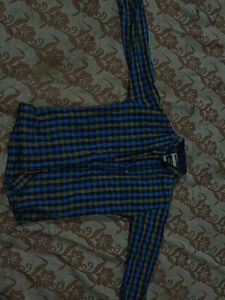 Blue and green plaid shirt